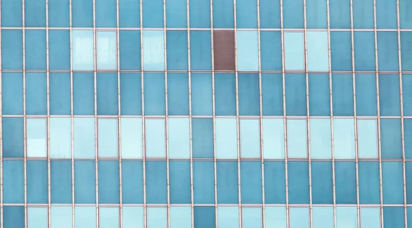Hochhausfenster als Hintergrund. Textur — Stockfoto