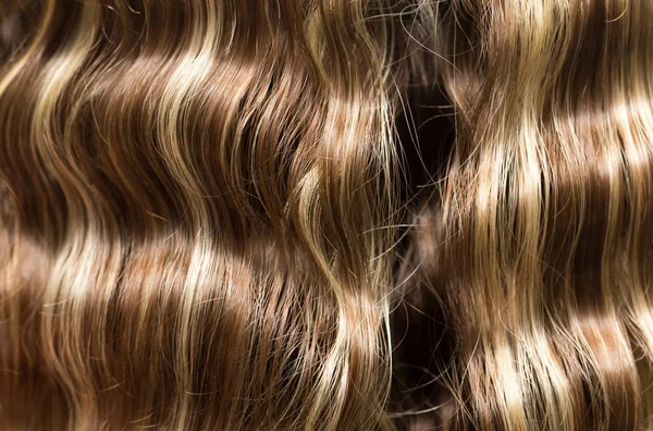 Хвилясте волосся як фон. текстура — стокове фото