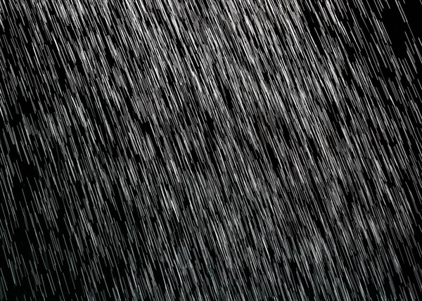 Lluvia sobre un fondo negro — Foto de Stock