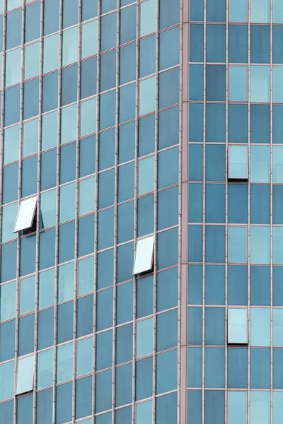 Wolkenkrabber windows als achtergrond. textuur — Stockfoto