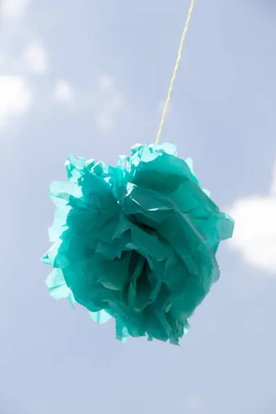 Blue bow on a background of blue sky — Stock Photo, Image