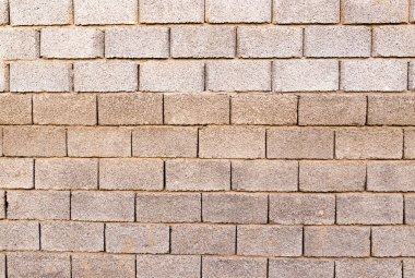 Arkaplan olarak tuğla duvar ve arkaplan. Soyut bir dokunun fotoğrafı