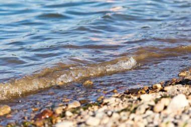 Sahilde arka plan olarak dalga .