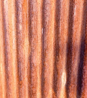 Arka planda paslı metal var. Soyut bir dokunun fotoğrafı