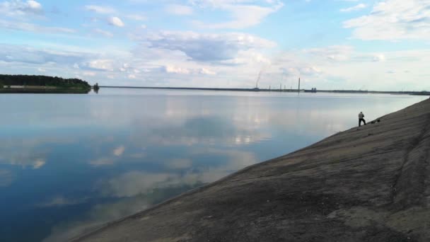 Scenic Footage People Fishing Calm Lake Reflection Clouds Water Surface — Stock Video