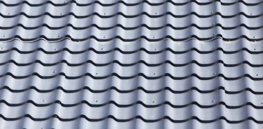 Arka planda metal çatı var. Soyut bir dokunun fotoğrafı