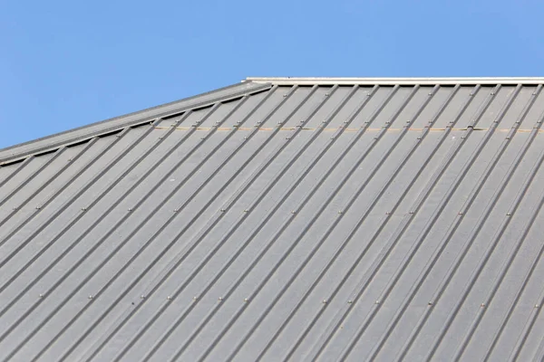 metal roofing roof as background . Photo of an abstract texture