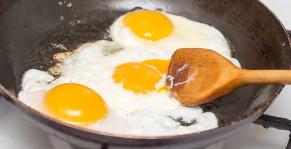 Fried egg in a frying pan . Photos in the studio