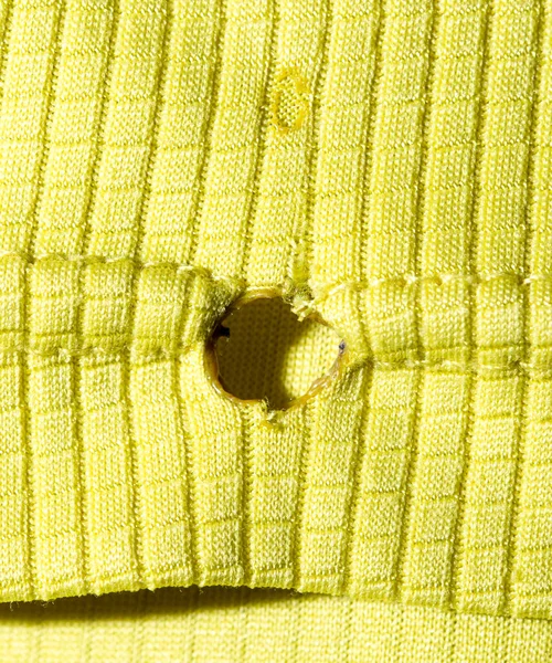 Dziura Papierosa Tkaninie Zdjęcie Abstrakcyjnej Tekstury — Zdjęcie stockowe
