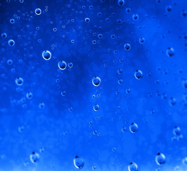 Mavi Soyut Su Düşürme Arkaplanı. Soyut bir dokunun fotoğrafı