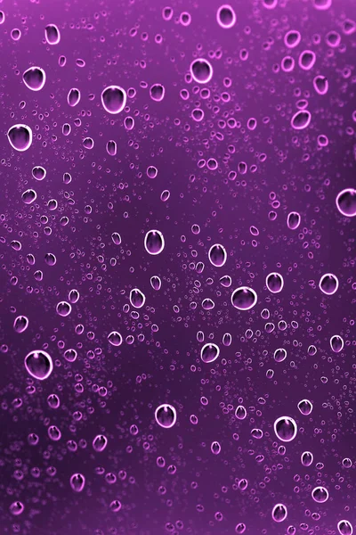 Cama su damlaları. Soyut bir dokunun fotoğrafı