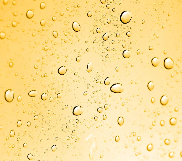 Złotej Wody Krople Szkło Zdjęcie Abstrakcyjnej Tekstury — Zdjęcie stockowe