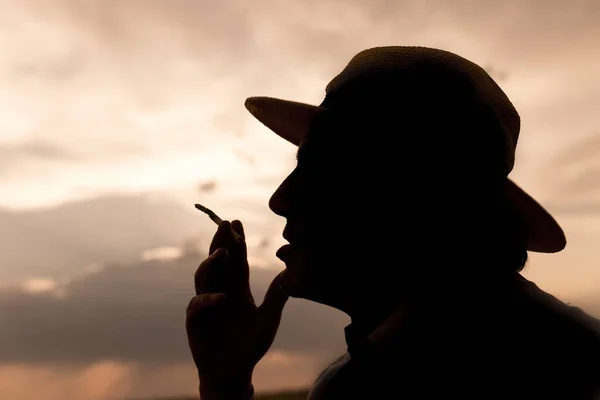 Silhouette Man Smoking Cigarette Sunset Background — Stock Photo, Image