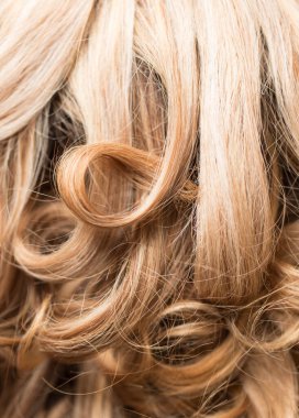 Güzel bir kadının saçının arkaplanı. Soyut bir dokunun fotoğrafı