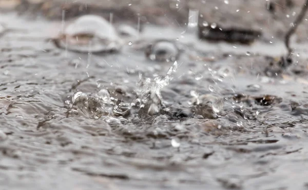 Vattenstänk Regnpöl — Stockfoto