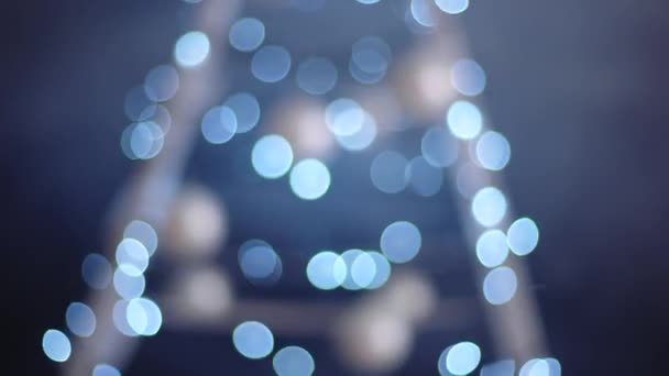 Abstract blurred blue bokeh background of garland — Stock Video