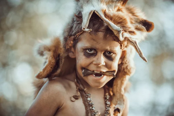 Angry funny caveman boy portrait. — Stock Image Angry funny caveman boy portrait. Stock Picture