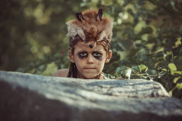 Caveman, manly boy hunting outdoors. Ancient warrior portrait. — Stock Image Caveman, manly boy hunting outdoors. Ancient warrior portrait. Stock Picture