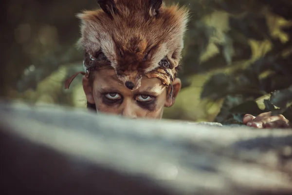 Caveman, manly boy hunting outdoors. Ancient warrior portrait. — Stock Image Caveman, manly boy hunting outdoors. Ancient warrior portrait. Stock Photo