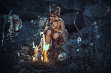 Şamanlar çocuğa ateş