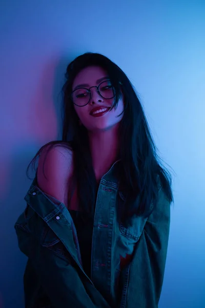 Studio Portrait of Asian Woman Over Urban Neon Lights. — Stock Photo, Image