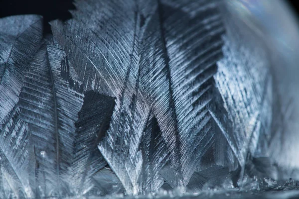 Замороженный рисунок снега крупным планом, зимние праздники фон , — стоковое фото