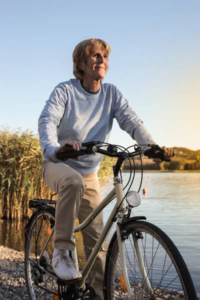 Senior Woman Riding Bike — Stock Photo, Image