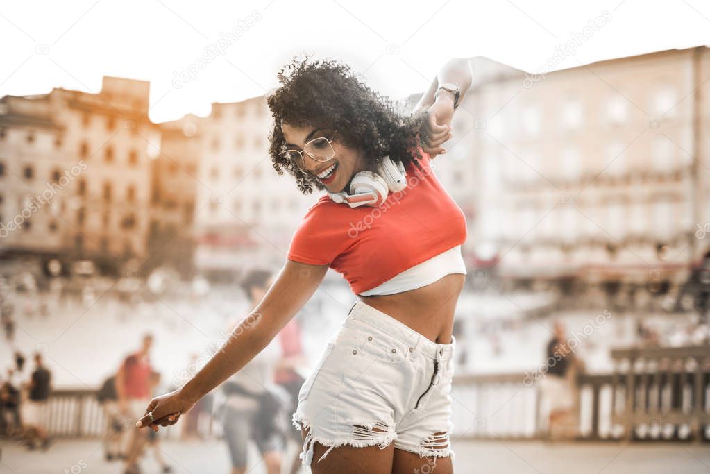 beautiful girl dancing in the street