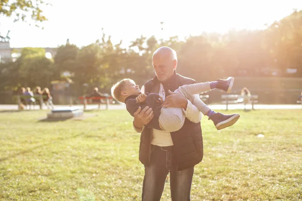 Grandfather Holding Having Fun His Grandson Outdoor — Stock Photo, Image