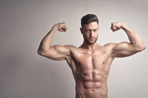 Muskulöser Mann Der Wand — Stockfoto