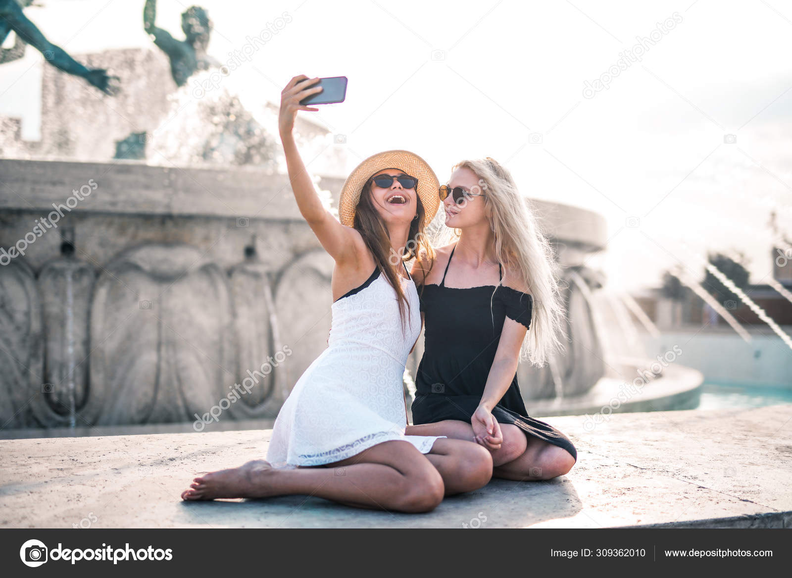 https://st4.depositphotos.com/1008939/30936/i/1600/depositphotos_309362010-stock-photo-two-girl-takes-selfie-city.jpg