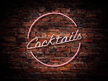 Bir Bar veya Pub dışında bir tuğla duvara bir pembe Neon kokteyller işaret