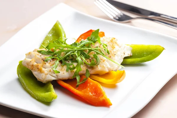 Cod with grilled peppers — Stock Photo, Image