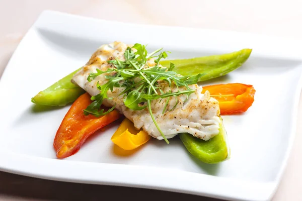 Cod with grilled peppers — Stock Photo, Image