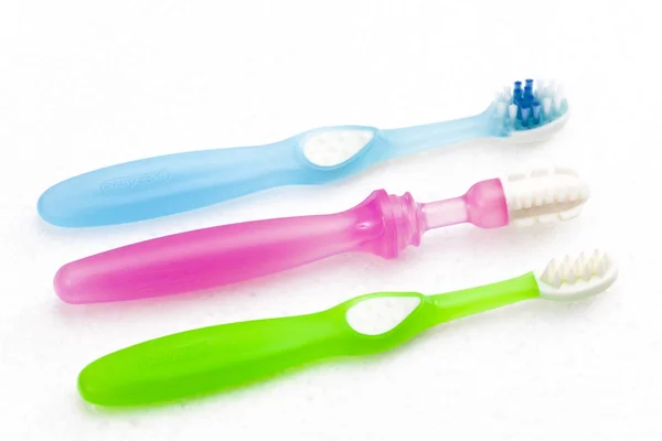 Κρίκοι Οδοντοφυίας και οδοντόβουρτσα — Φωτογραφία Αρχείου
