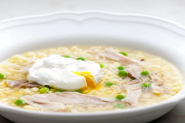 Poultry soup with egg — Stock Photo, Image