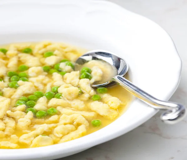 Beef bouillon with dumplings — Stock Photo, Image