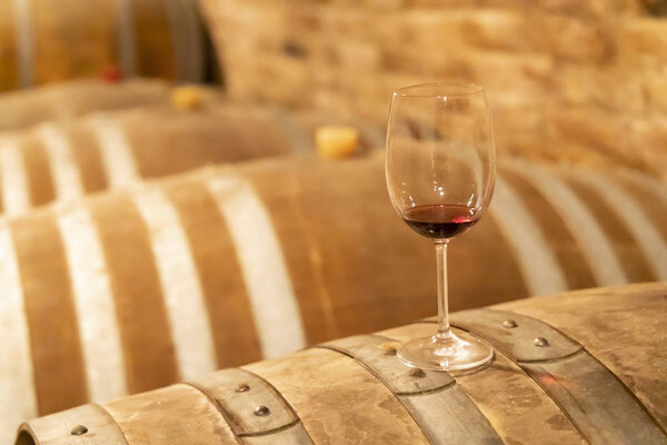 glasses of wine on barrel, Szekszard, Hungary