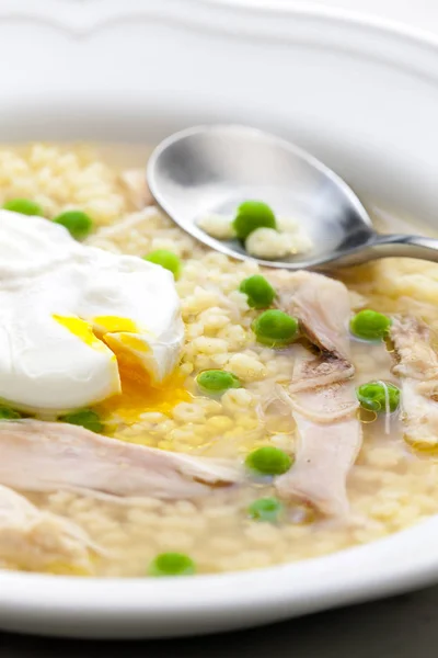Still life of poultry soup with egg — Stock Photo, Image