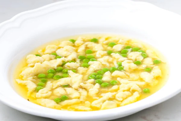 Beef bouillon with dumplings — Stock Photo, Image