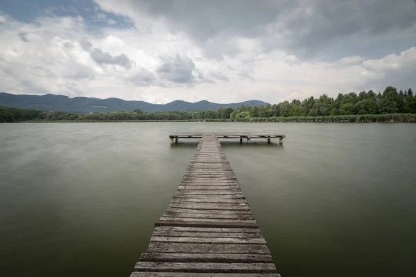 Pier on the pond Jenoi-to, Hungary — Stock Photo, Image