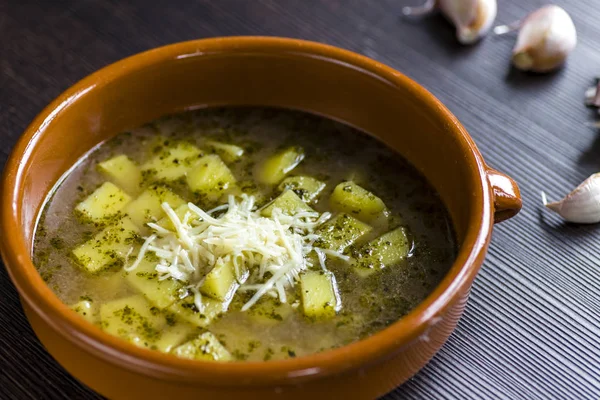 Garlic soup with potatoes and marjoram — Stock Photo, Image