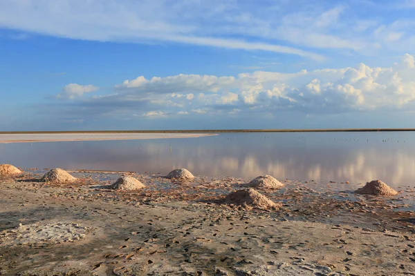 landscape with heaps of salt on the shore of a salt lake in Ukraine. Azov Sea