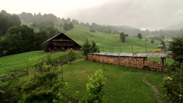 Rain in the mountain Switzerland small vilage — Stock Video