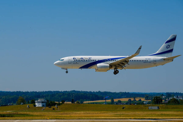 Elal Israel airlines airplane preparing for landing at day time in international airport
