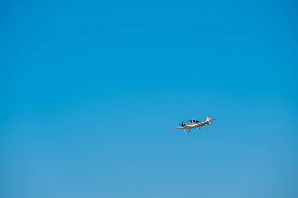 Small private jet airplane preparing for landing at day time in international airport — Stock Photo, Image