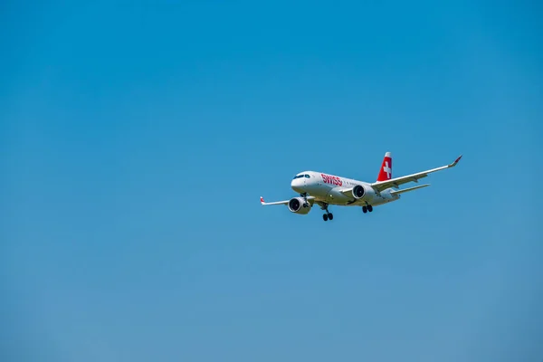 Swiss airlines airplane preparing for landing at day time in international airport — Stock Photo, Image