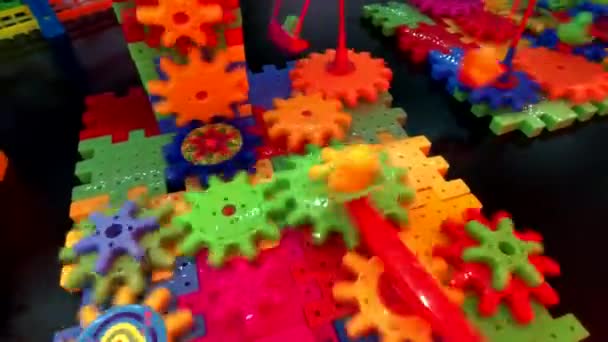Rotación Plástico Multicolor Engranajes Fondo — Vídeo de stock