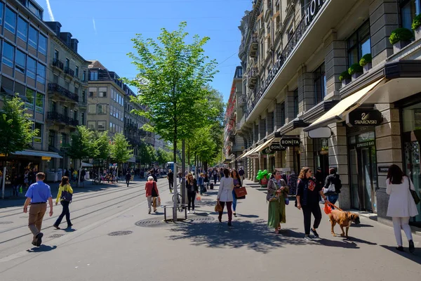 People and city transport at Bahnhofstrasse at the morning time — Stock Photo, Image