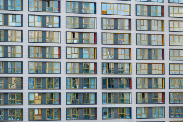 Windows on the facade of a modern high-rise building.